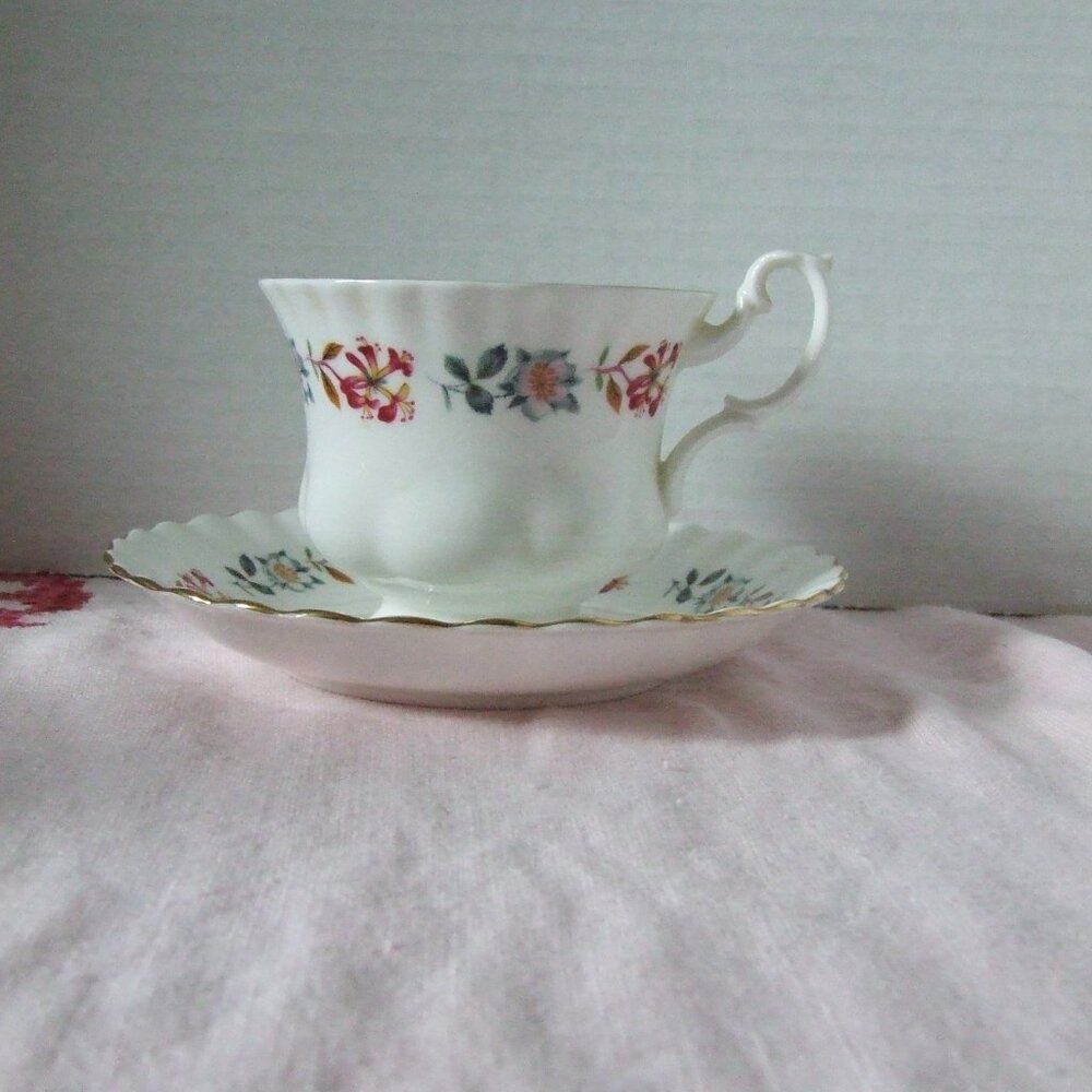 Royal Albert teacup and saucer vintage bone china pink and blue flower pattern